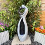 Solar Couple Embrace Contemporary Water Feature
